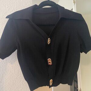 Black short-sleeve with gold buttons